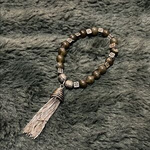 Elegant Silver and Brown Beaded Bracelet with Tassel
